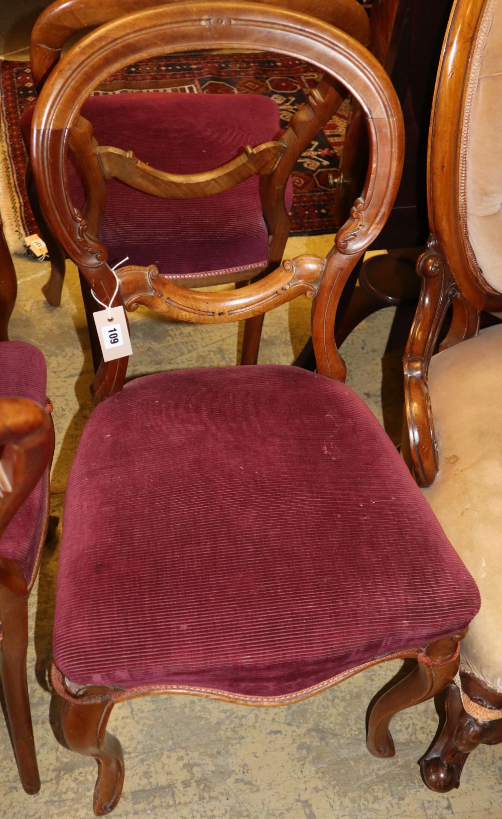 A set of six Victorian mahogany balloon back dining chairs